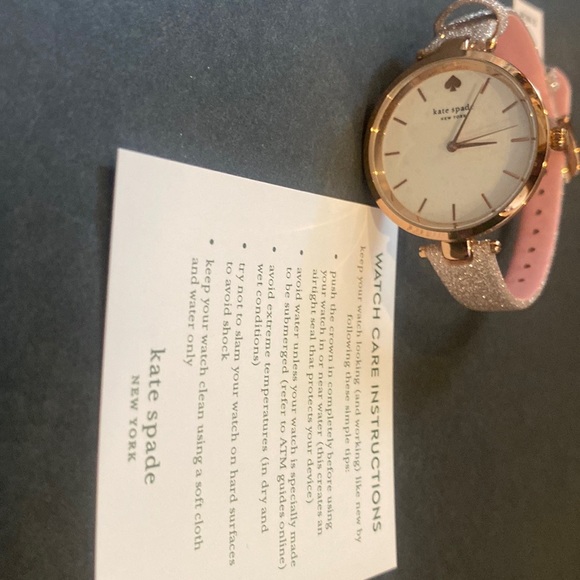 Kate spade- Polka Dot watch with leather band.